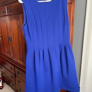 Bright blue short dress. Size 12 pleated front and back.